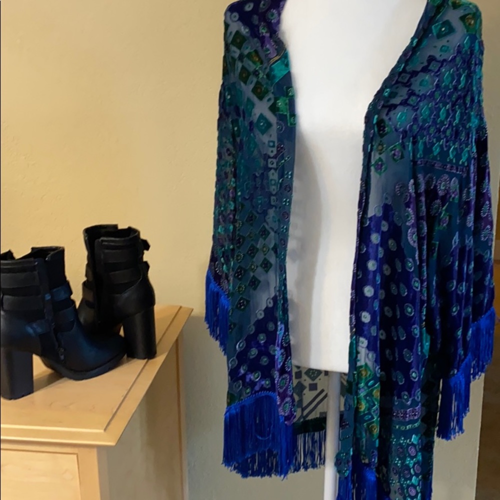 Multi colored vintage vest with fringe
